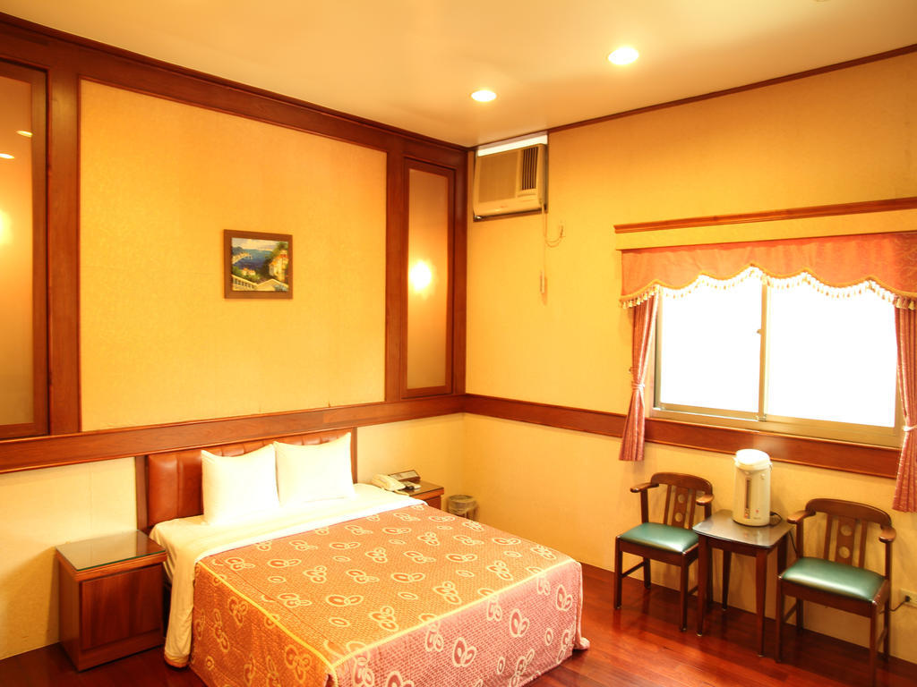 Fukun 5 Motel Jiaoxi Habitación foto